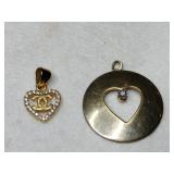 2  gold filled  heart charms.   .100oz