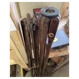 2 wooden surveying tripods