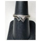 Silver ring marked 925 size 6.5.    .075oz