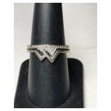 Silver ring marked 925 size 7.    .075oz
