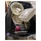 Tote of plastic food storage containers and bowls