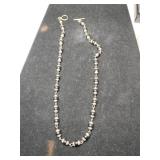 Silver and black necklace marked 925.    1.135oz