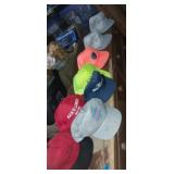 Trucker hats with advertisements and hard hats