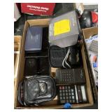 Digital cameras with cases, tablets, calculators