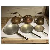 Vintage copper cookware and tea kettles