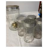 3 Hoosier glass spice shaker jars and 1 Hoosier