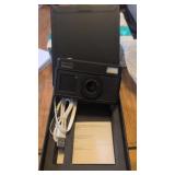 Digital camera with charger