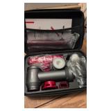 Handheld vacuum cleaner with charger and storage