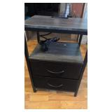 Small side table with 2 drawers and power strip.