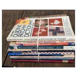 Stack of Quilting project books, patterns