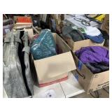 Coats, clothing, blankets, suitcase