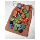 Marbles in brown bag