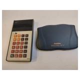 Vintage calculator and a Franklin spelling Ace
