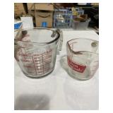 Two anchor measuring cups one is 1 quart and the