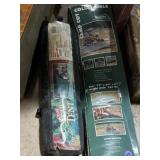 Collapsible camp cot and trail tent both look