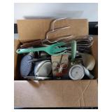 Box of vintage kitchen utensils and items.