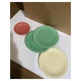 Three fiesta, dinner plates, and one saucer