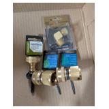 Assorted solid brass quick-connect fittings for