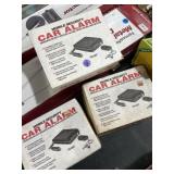 (3) new car alarms, 1 open box