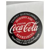 12 in round metal Coca-Cola sign