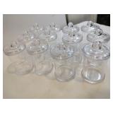 12 plastic lidded containers