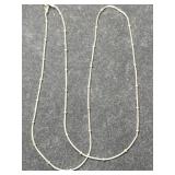 Silver long beaded necklace marked 925.  .100oz