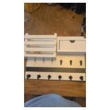 Hanging key holder with extra storage