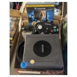 Nintendo GameCube with controller and 007 game