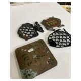 Collection of cast-iron trivets