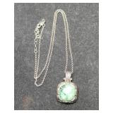 Silver green stone necklace marked 925.   .320oz