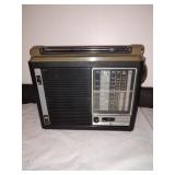 Group of two General Electric radios and Lady