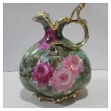 Hand painted pitcher aprox. 9in and 6.4in across