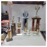 9 bowling trophies