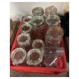 Tall clear glass canisters with metal bail hinges