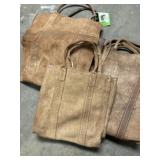 Lot of leather log carriers and bags