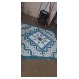 Blue green and white embroidered quilt 76x82in