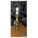 Footed brass table lamp