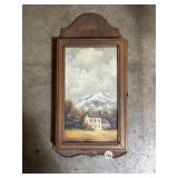 Wall-mounted wooden cabinet with original art