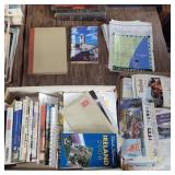 Assorted travel books and maps