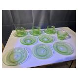 UV green depression glass saucers, creamer, cups,