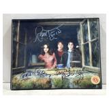 framed promotional photograph w/ signatures from