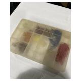 Fishing tackle with plastic divider container