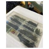 Fishing tackle with plastic divider container