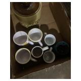 Mugs and a cookie jar