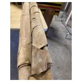 Two rolls of tanned leather