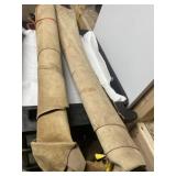 Two rolls of tanned leather