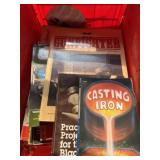 Crate full of informational literature, including