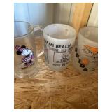 2 collectible Florida mugs, and one Minnie mouse