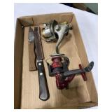 Two open face reels and two knives