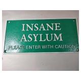 Cast iron insane asylum sign 10.5x5